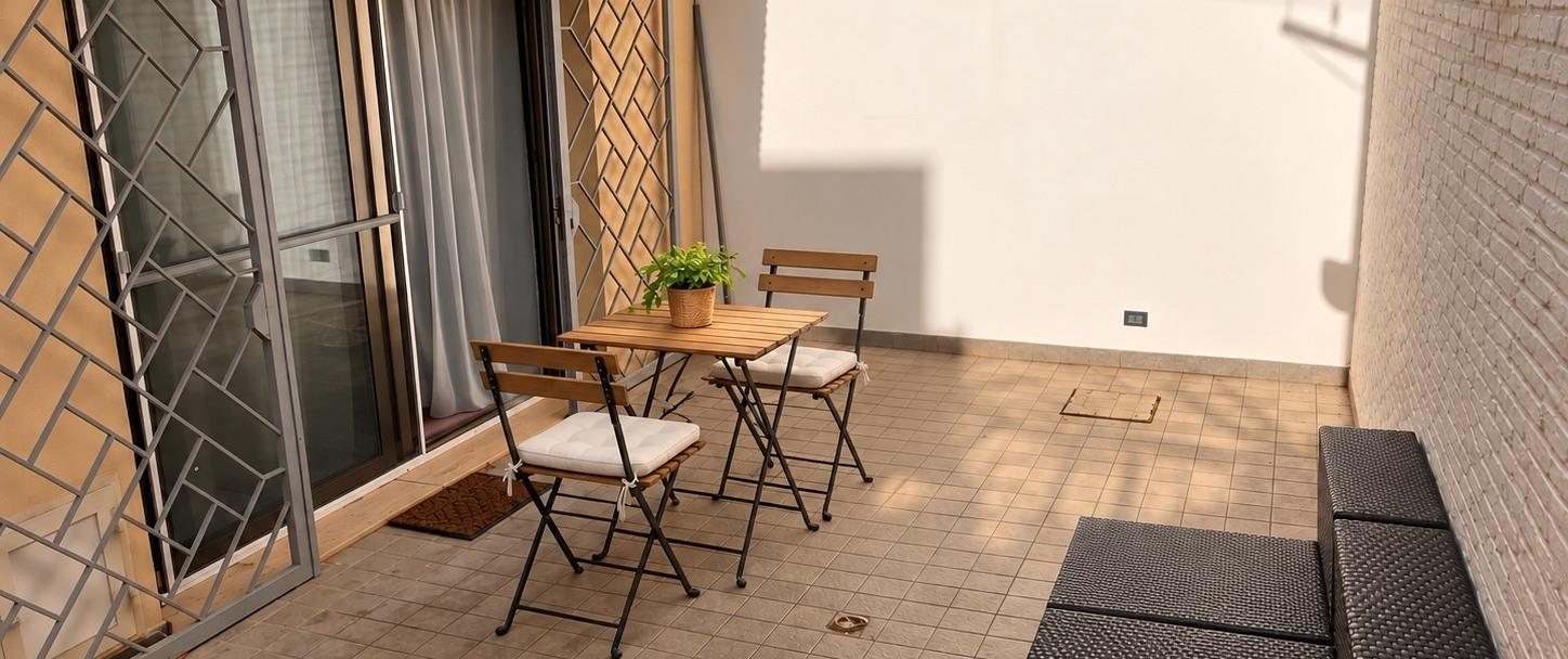 Private courtyard with bistro table and chairs